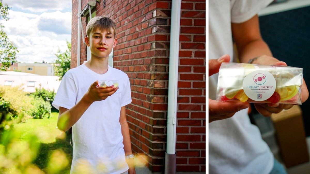 Alfred håller upp en påse Friday Candy-godis utanför sitt hus